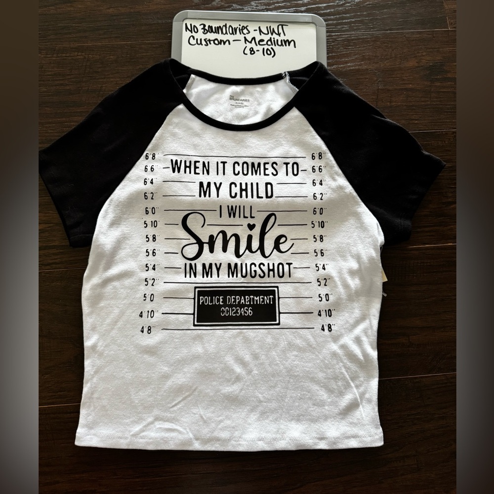 Mamas Black and White “When it comes to my child I will smile on mugshot” crop